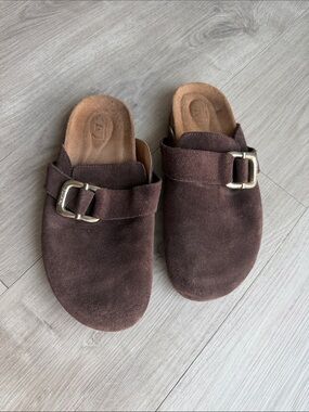 Flattered brown suede shoes